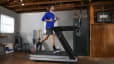 The benefits of a manual treadmill or a non-motorized treadmill, man runs on treadmill
