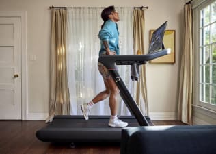 Woman does a treadmill workout for beginners