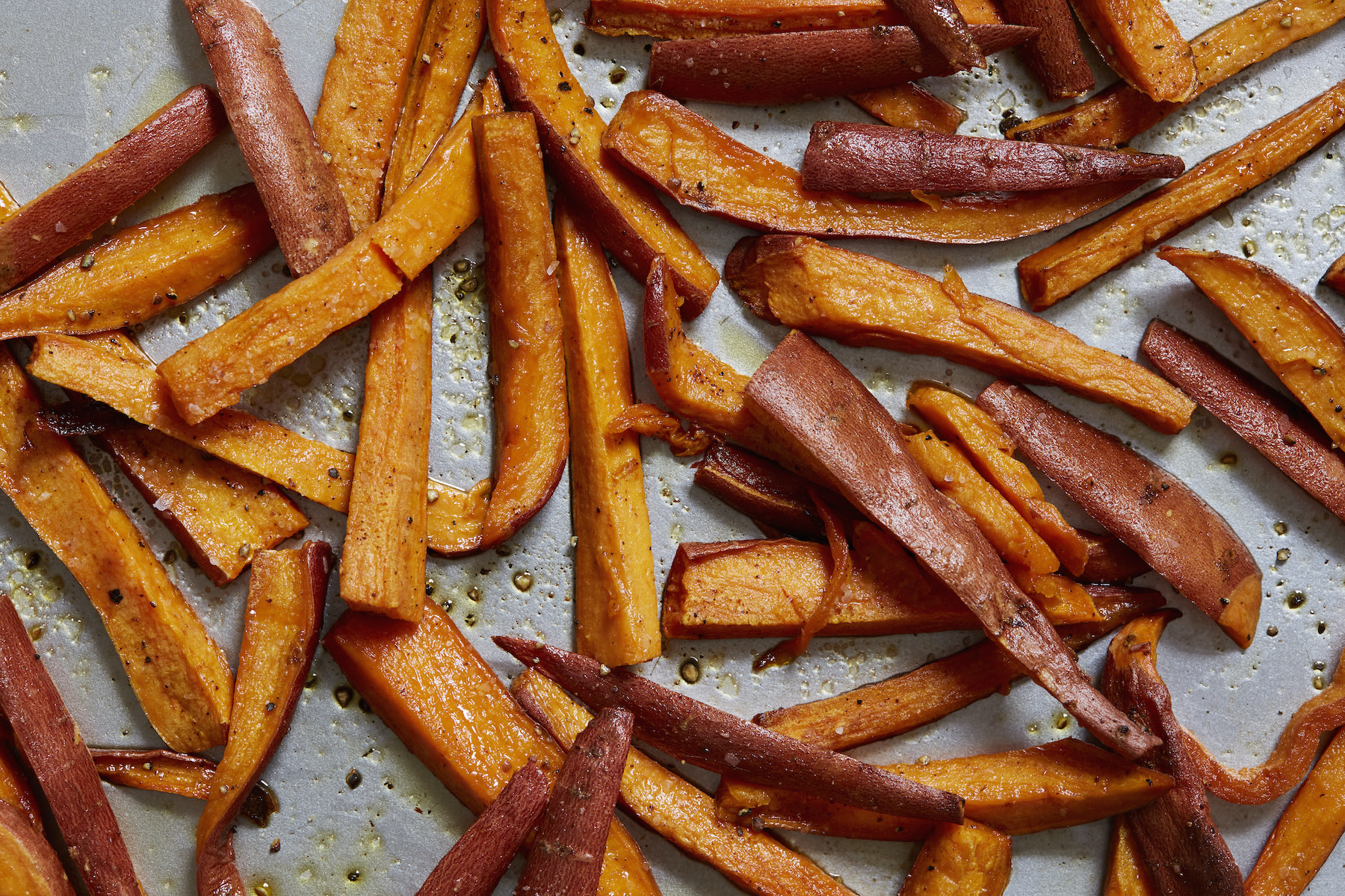 High-Fiber Foods: Sweet potato fries on a baking sheet.