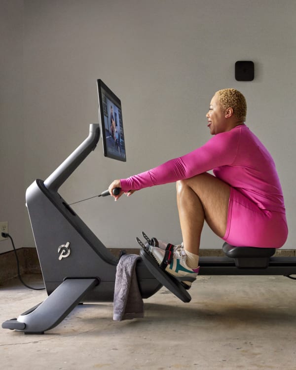 A Peloton Member using the rower in his home